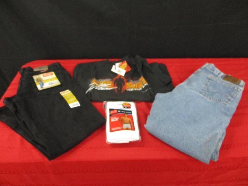lot 126 image: Wrangler Relaxed Fit Jeans 33x30 Tags Still On , Insulated Jeans size 36x32 and two new packs of no fly boxers size medium, T-shirt Tony Stewart Winners Circle Size Large, tags still on it