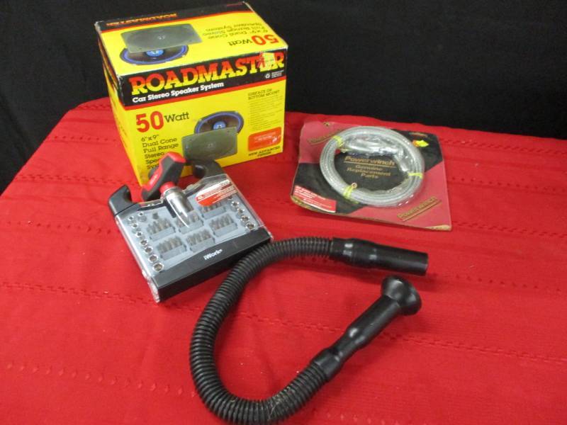 lot 131 image: Speakers still in a box, T handle racheting screwdriver set, 20ft cable with hook new in package and flexible flashligh