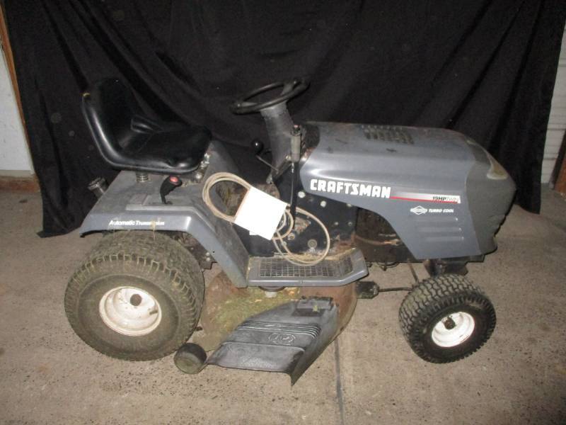 lot 12 image: 19 HP Craftsman Mower with 42 deck and extra belt. Weak Battery.