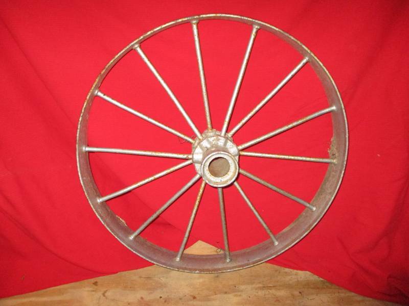 lot 21 image: 4 wide 32 Tall Steel wheel