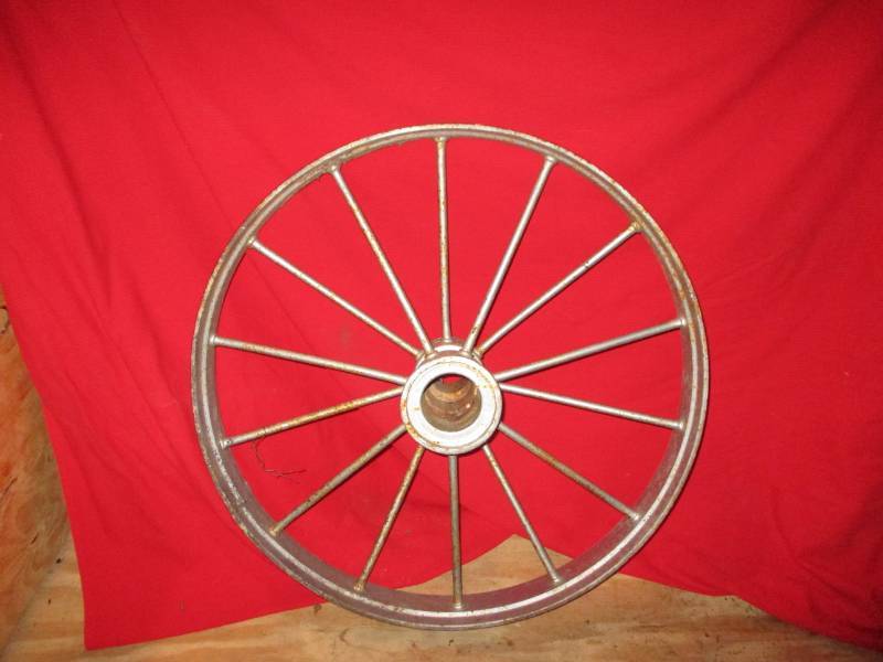 lot 22 image: 4 Wide 32 Tall Steel Wheel