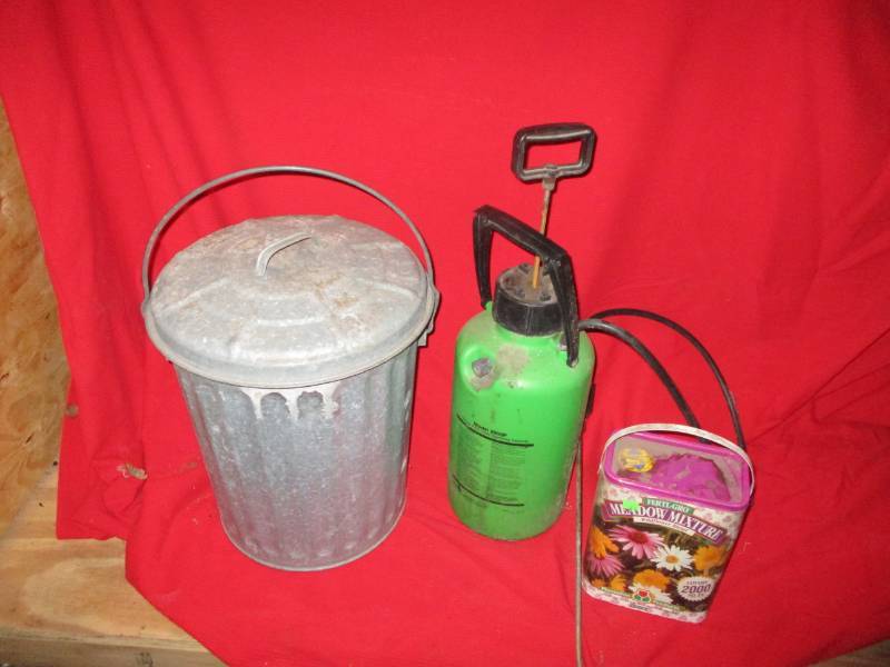 lot 31 image: Garbage can, sprayer and wildflower seeds