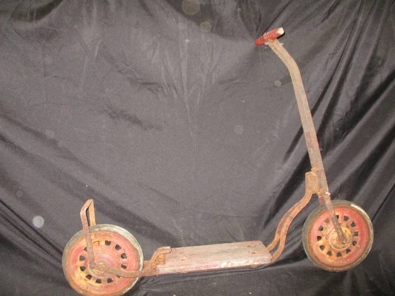 lot 73 image: Antique Scooter with wood handle
