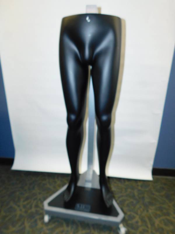 lot 62 image: Mannequin Legs On Three Wheeled Base