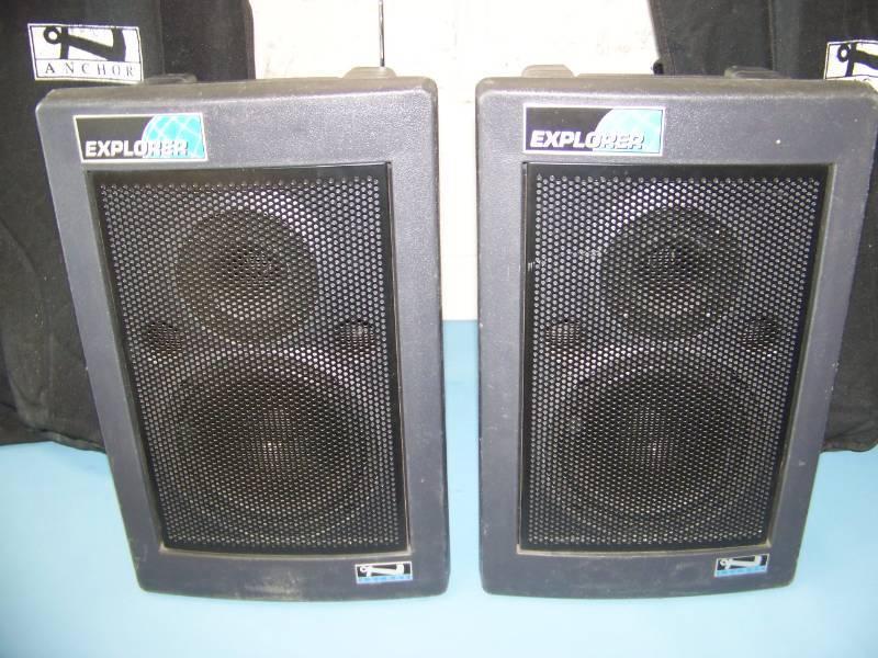 lot 22 image: (2) Anchor, Explorer, PA Speakers  Portable, Amplified Speakers with Wireless Microphone Receiver and Antenna and Cases