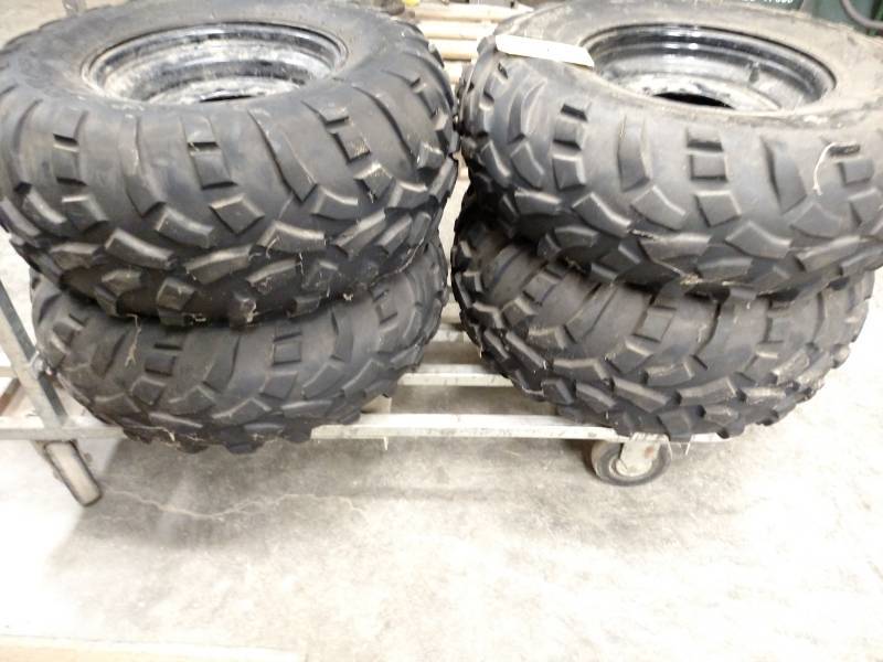 lot 81 image: (4) Polaris ATV Wheels & Tires, 25x...