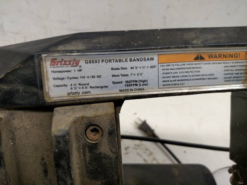 lot 82 image: Grizzly Portable Bandsaw with Extra...