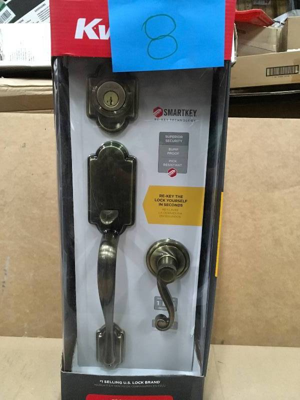 lot 8 image: Kwikset Arlington Single Cylinder Handleset wLido Lever featuring SmartKey in Antique Brass Not used