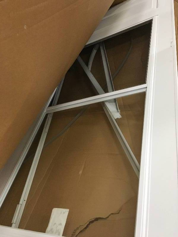 lot 13 image: EMCO 36 in. x 80 in. 100 Series Plus White Self-Storing Storm Door 29931 missing frame Not used