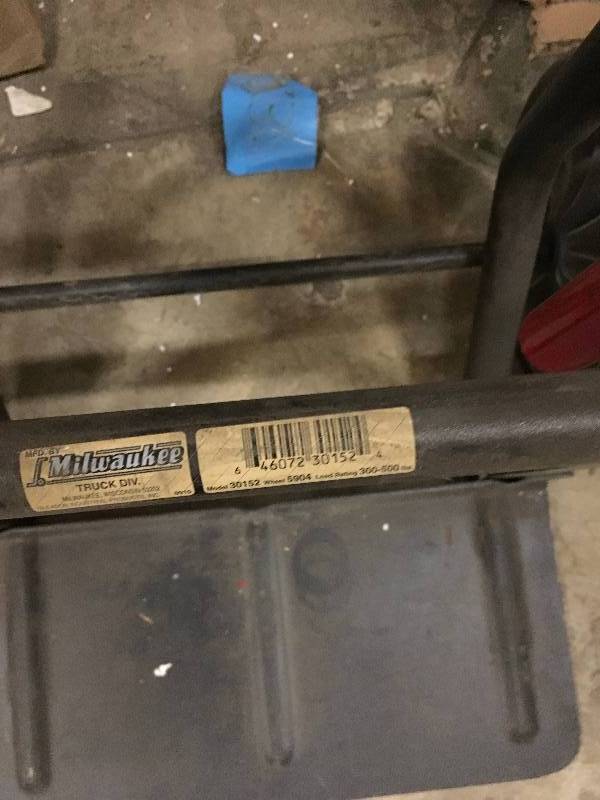 lot 64 image: Milwaukee Hand Truck Push Car 300500 lb. Capacity Convertible Moving Trolley Missing wheels & pins