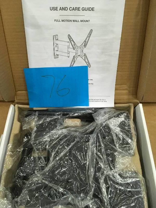 lot 76 image: Commercial Electric Full Motion TV Wall Mount for 20 in. - 56 in. TVs Not used
