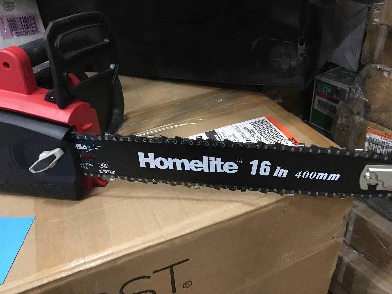 lot 86 image: Homelite 16 in. 12 Amp Electric Chainsaw in working condition