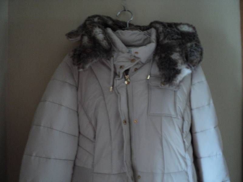 womens new coat size XL with hood...