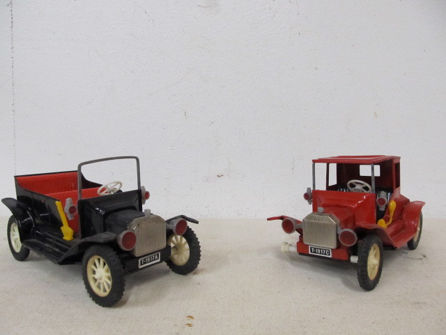 lot 27 image: 2 Vintage Japanese Tin Friction Ford Model-T Toy Cars