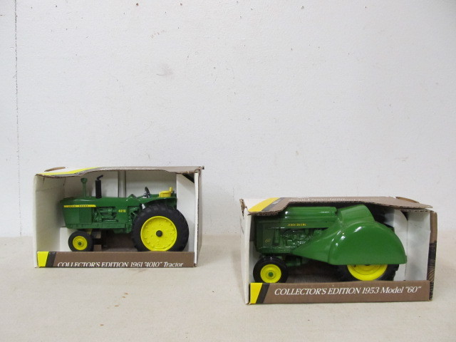 lot 44 image: Pair of NIB Diecast JOHN DEERE Tractors