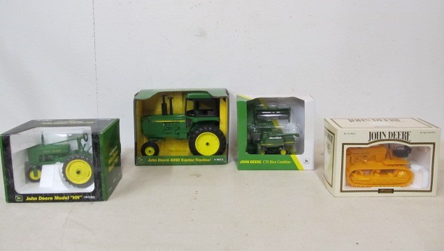 lot 46 image: Group of NIB Diecast JOHN DEERE Tractors etc