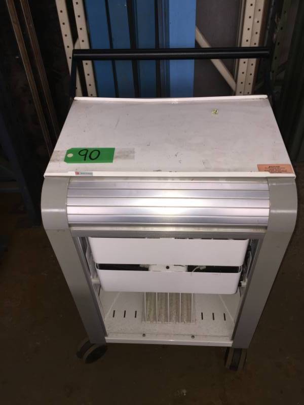 lot 90 image: Four-Wheel Rolling Cart  charging station