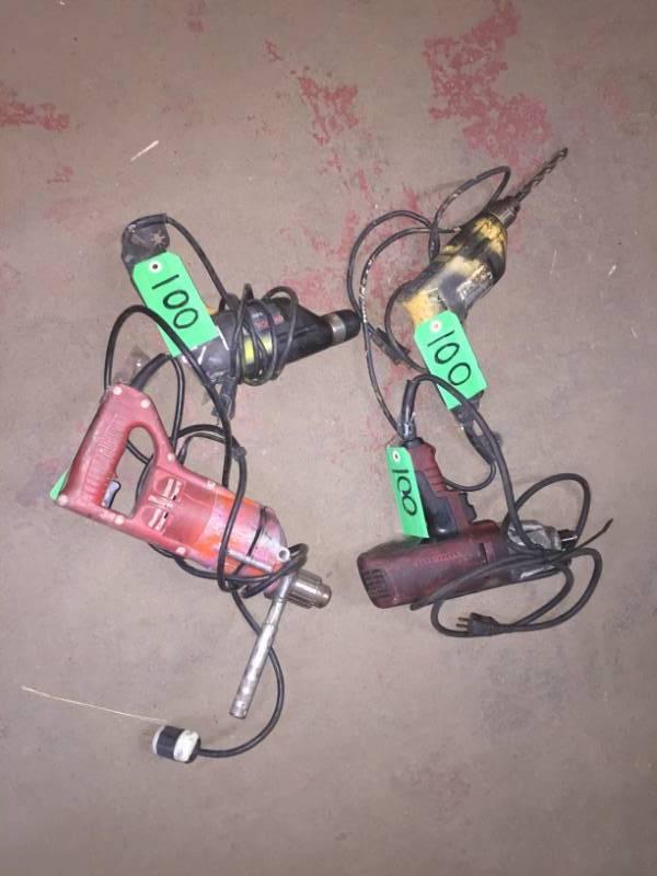 lot 100 image: Four hand drills corded