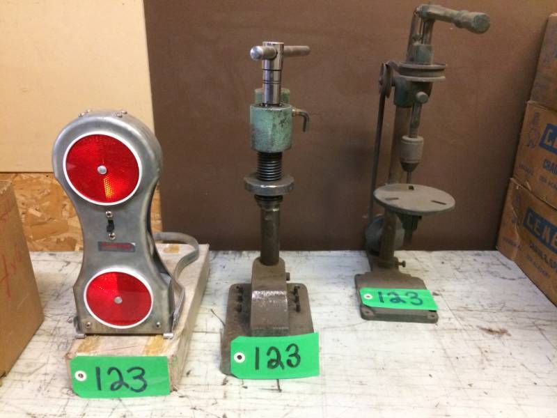 lot 123 image: Two Vintage item - 1 press, 1-drill and Two Flagman swinging battery operated Warning signal (new, vintage)
