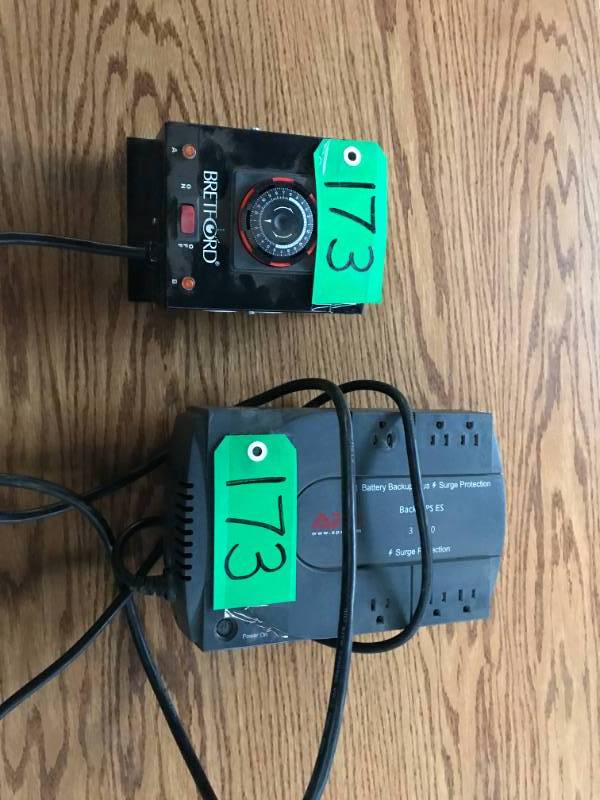 lot 173 image: Bretford Multi-outlet timer& batter back up plus surge protection