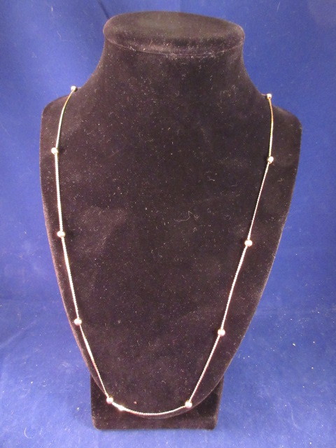 lot 902 image: 14K YELLOW GOLD SERPENTINEBEAD 24 NECKLACE