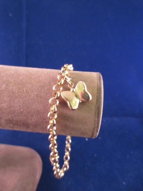 lot 903 image: 14K YELLOW GOLD MILOR BUTTERFLY CHARM BRACELET 7 12