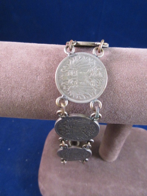 lot 820 image: ANTIQUE 10 SILVER COIN BRACELT