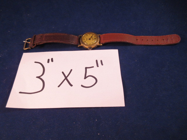 lot 828 image: CENTRAL USA SHOCKPROOF ANTIQUE VINTAGE WATCH