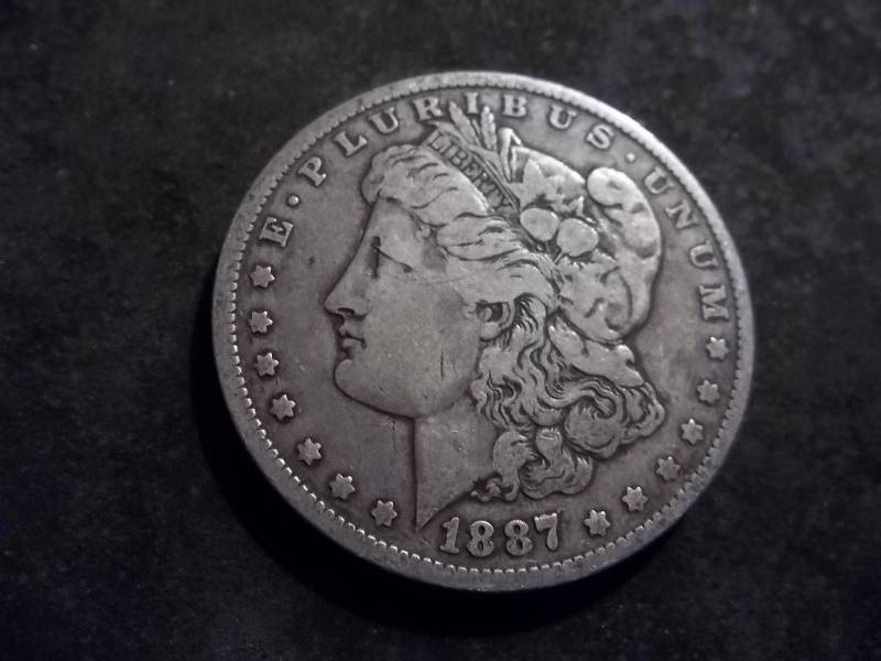 1887 O-7 Over 6 Morgan Silver Dollar Restrike