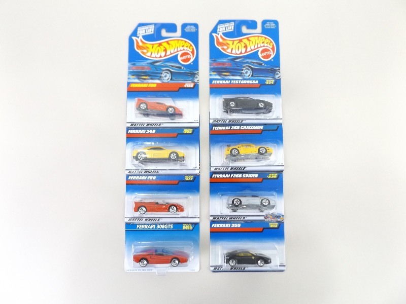 lot 24 image: 8 NEW Hot Wheels Ferraris 