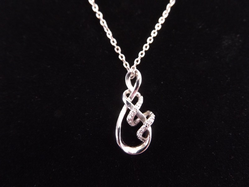 lot 55 image: NEW .925 Sterling Silver and Diamond Pendant on Sterling Chain