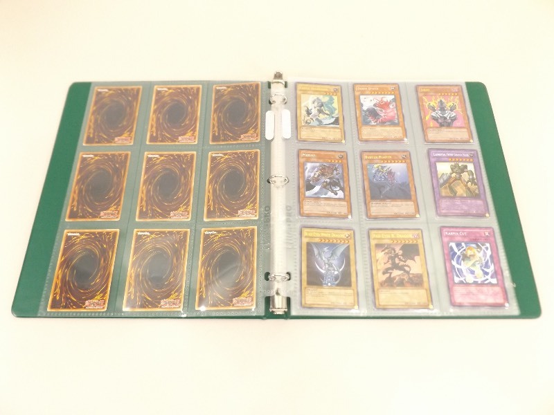 lot 69 image: 34 - Limited Edition and 1996 1st Edition Yu-Gi-Oh Cards in Binder