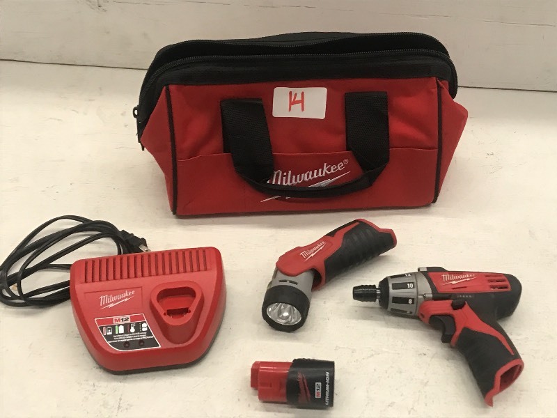 lot 14 image: Milwaukee Cordless Drill & Flashlight Tool Set