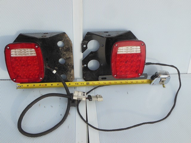 lot 33 image: LED Tail Lights connected with Harness - SAE A 16 (2)R S2 (3)T 08 DOT