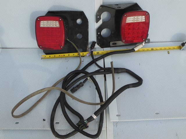 lot 35 image: LED Tail Lights connected with Harness - SAE A 16 (2)R S2 (3)T 08 DOT