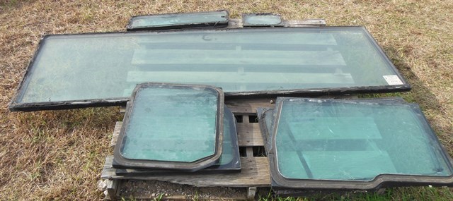 lot 40 image: Laminated Bullet Resistant Glass from Brinks International 4700 DT 466E Armored Car