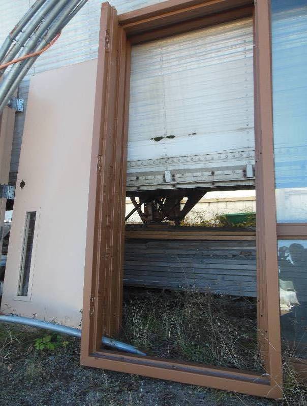 lot 52 image: Heavy Duty Steel Door with In-Door Light (Binswanger Laminated Safety Glass) and Steel Frame (Yes, both are upside down in the photo)