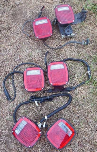 lot 133 image: Connected Chrysler Tail Lights, Connected Grote and Signal-Stat Tail Lights  (and 2 Grote Lights) - Truck Take Offs