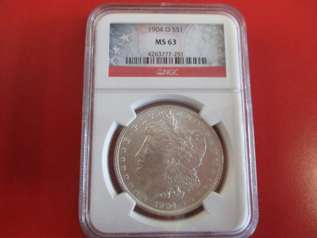 lot 6 image: NGC Certified (Stars and Stripes Limited Edition Logo) 1904-O (New Orleans Mint) Morgan Silver Dollar  4263777-251 certification number.