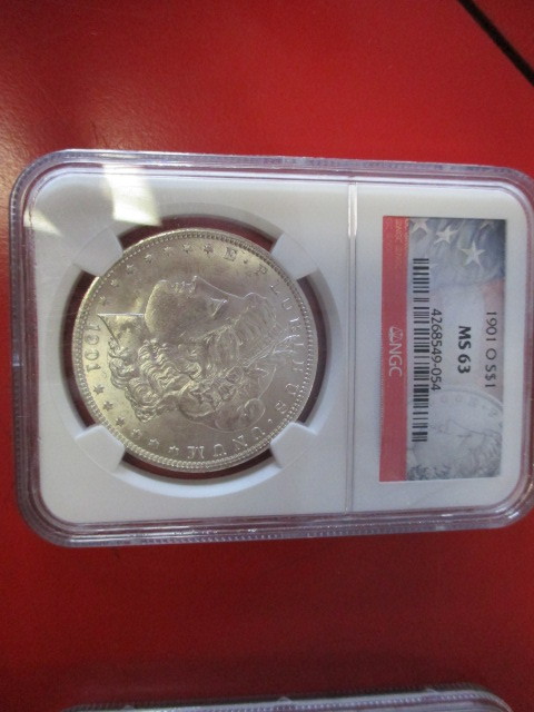 lot 10 image: NGC Certified (Stars and Stripes Limited Edition Logo) 1901-O (New Orleans Mint) Morgan Silver Dollar  4268549-054 certification number.