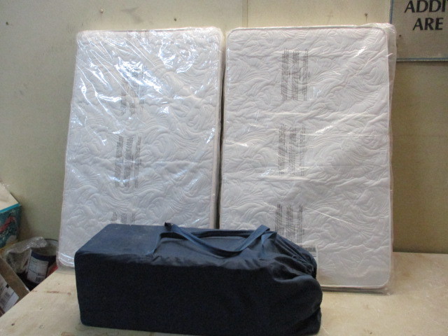 lot 95 image: Crib Mattresses and Pack n play