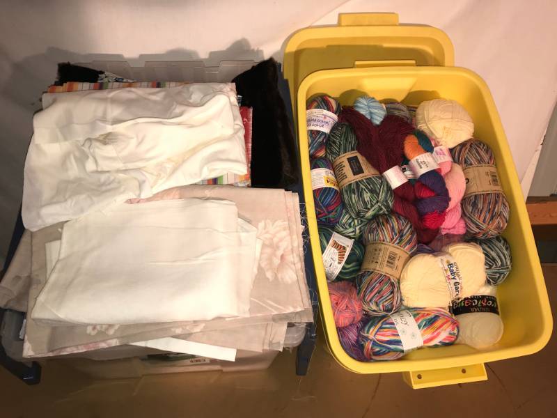 lot 208 image: Bin of Fabric and Bin of Yarn