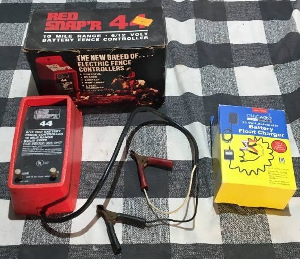 lot 332 image: Battery Charger and Electric Fence Controller