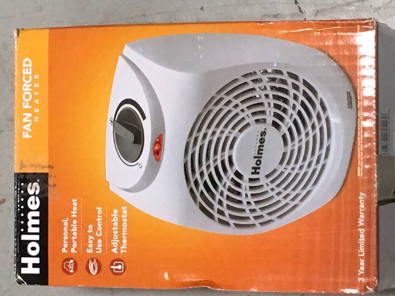 lot 32 image: Holmes 1200-Watt Personal Fan Heater with Manual Control  in good working condition
