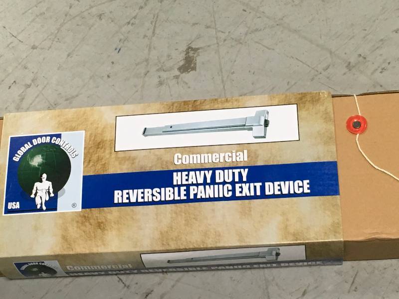 lot 34 image: Global Door Controls 32 in. Aluminum Touch Bar Exit Device not used