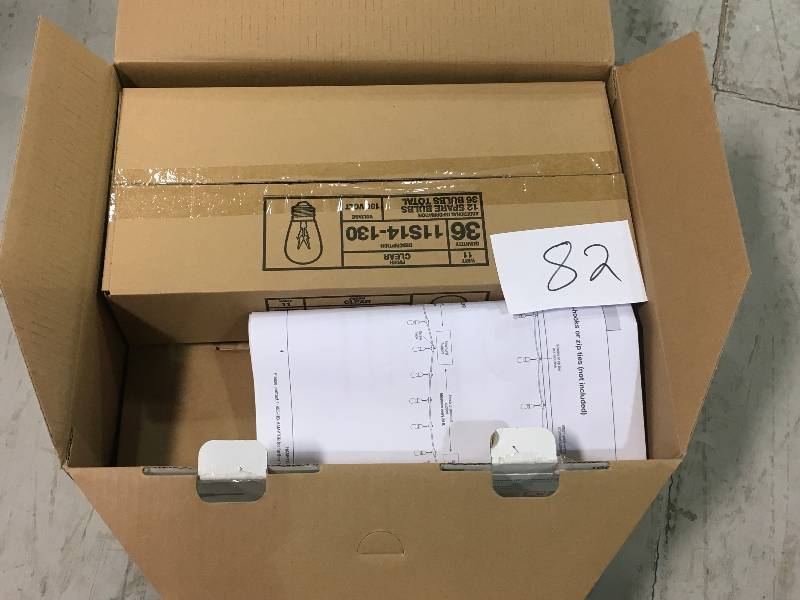 lot 82 image: Hampton Bay 48 ft. 24-Socket Incandescent String Light Set not used