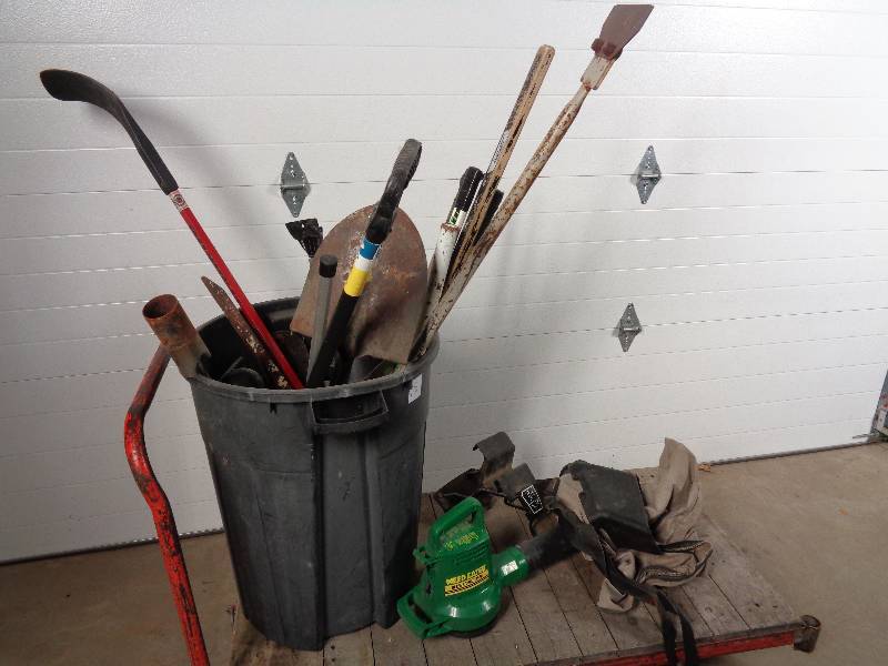 lot 15 image: Can of Long Handle Tools