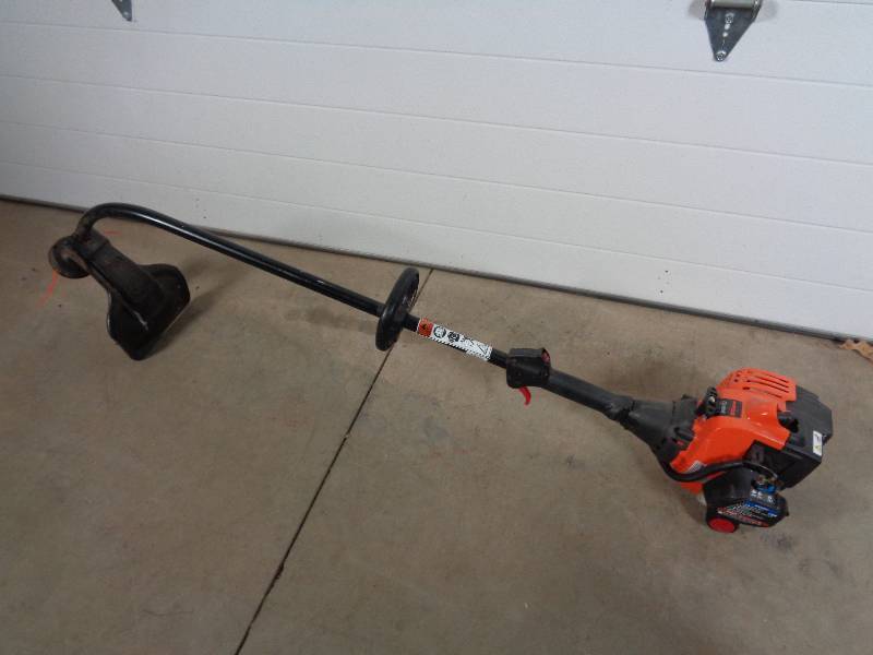 lot 23 image: Remington Gas Weed Whacker