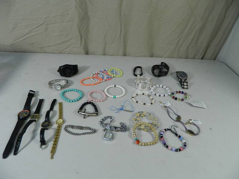 lot 6 image: Bracelets and Watches