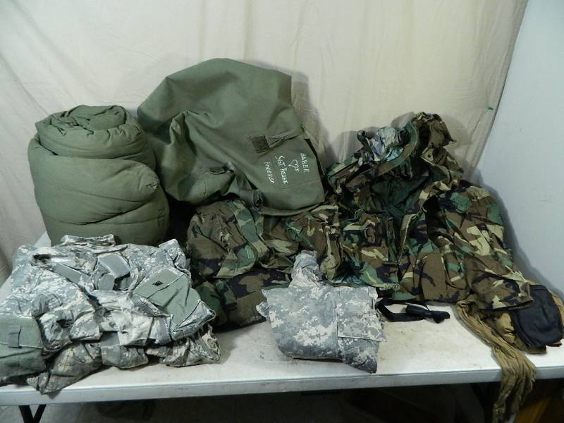 lot 108 image: Assorted Military Clothing and Sleeping Bag